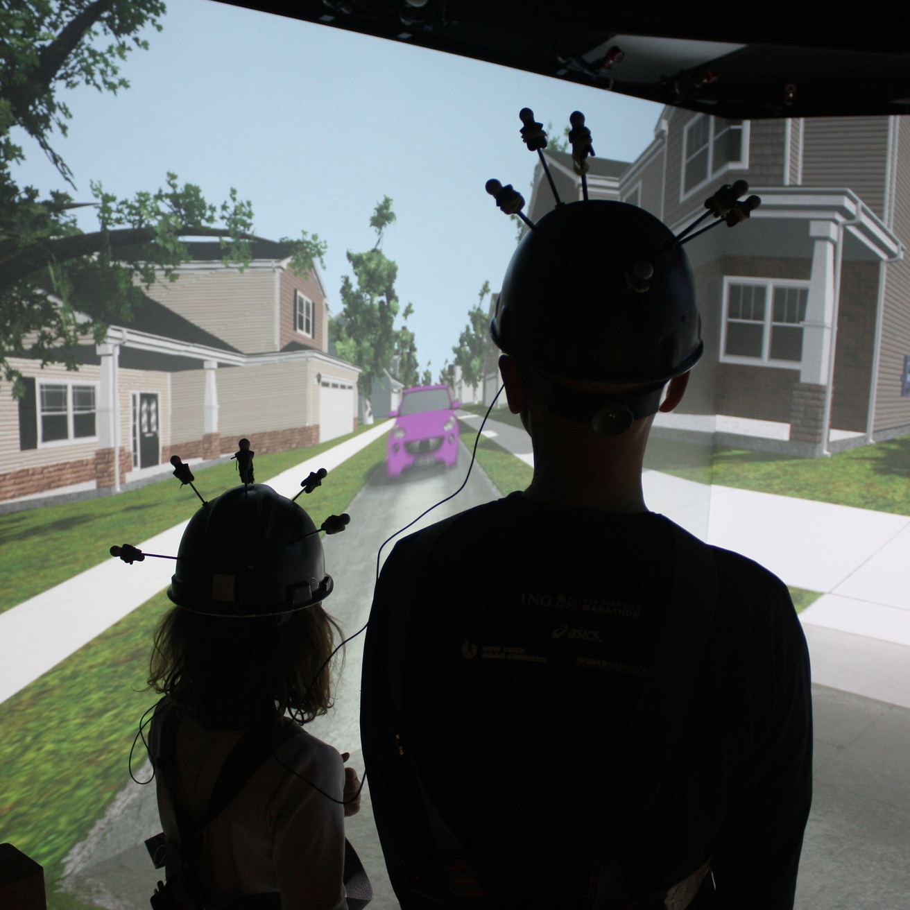 Pedestrians waiting to cross a virtual roadway environment